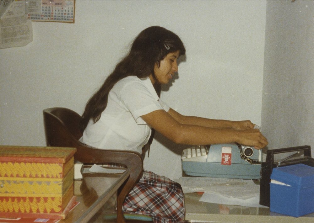 Someone working at a typewriter